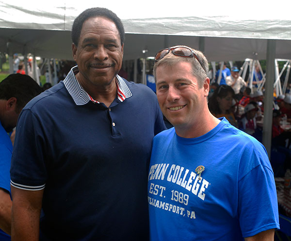 Rob Cooley, an assistant professor of anthropology and environmental science – who, as a fourth-grader  won a contest to see Dave Winfield play at Yankee Stadium – enjoys a campus reunion.