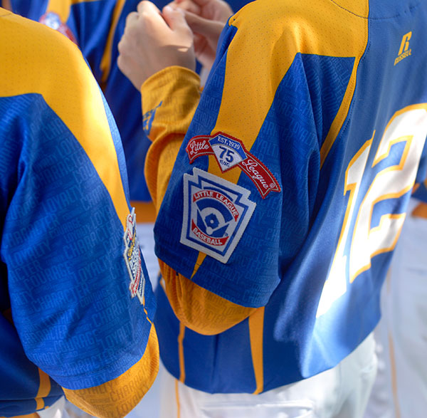 A patch on players' uniforms denotes the 75th anniversary of Little League Baseball.