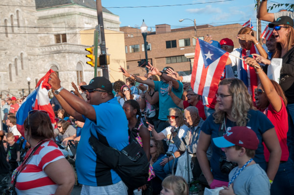 … and the Puerto Rico faithful wave their colors.