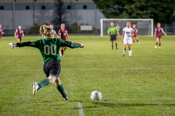 Keeper Colleen E. Bowes,of Wayne, launches the ball into play.