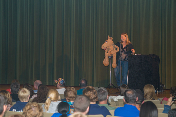 Camelot, a camel character commanded by Trefzger, jokingly harasses audience members. 