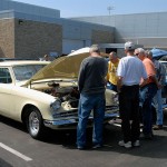 Studebaker owners enjoy some catch-up time on a gorgeous late-summer afternoon.