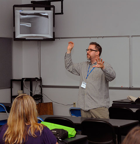 Brian Mayer engages his audience in a discussion of nondigital game design ... 