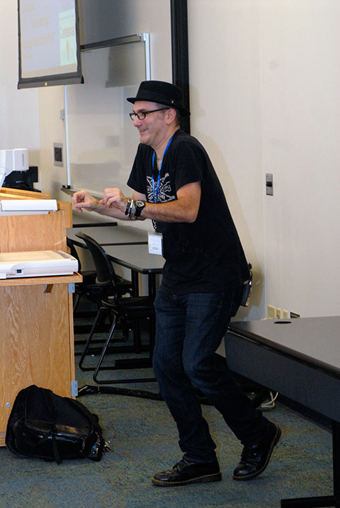 Eric Stuart's body language accents his storied voice.