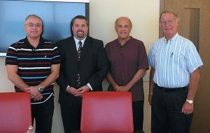 Cygan (second from left) is joined by members of the committee that heard his dissertation defense (from left): Roger G. Gonzalez and committee chair John M. Gould, associate clinical professors in Drexel's School of Education, and William J. Martin, senior vice president at Penn College.