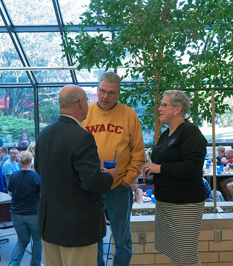 Richard M. Colegrove, who graduated from Williamsport Area Community College in 1972 with a degree in social work, talks with President Davie Jane and Fred Gilmour in the Keystone Dining Room. Colegrove's son, Max A., is a first-year aviation technology student at Penn College.