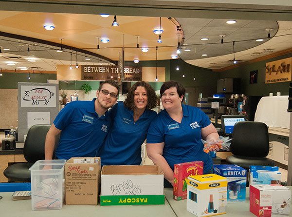 Helping to ensure the weekend runs smoothly are (from left) Anthony J. Pace, Kimberly R. Cassel and Sara H. Ousby, part of the winning Student Activities team in charge of the events.