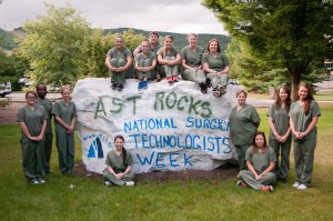 Pennsylvania College of Technology surgical technology students painted a campus landmark in honor of National Surgical Technologists Week. Atop the rock, from left, are: Reda A. Vermilya, of Turbotville; Holly M. Neely, of Lebanon; Ronald M. Furr, of Sunbury; Victoria L. Candelora, of Shamokin; Ashley Holmes, of Muncy; and Chelsea E. Oldt, of Muncy. Ground level, from left: Leah M. Aldrich, of Hallstead; Emeka K. Okereh, of Williamsport; Jade E. Stover, of Jersey Shore; Rachel L. Carlson, of Blossburg; Nola C. Hitchens, of Williamsport; Margaret H. Hartman, of Leesport; Liliya S. Stefanovich, of Port Matilda; and Allison M. Fowler, of East Berlin.