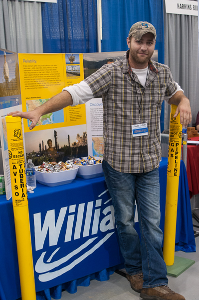 Shane M. Spotts, a 2009 forest technology graduate, staffs the Williams Gas Pipeline-Transco display. The Jersey Shore-based company was particularly interested in talking with surveying and civil engineering technology majors.