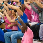 Fans at the "Pink Out,"  some wearing Wildcat Blue, show their colors ... 