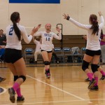 Sophie Coldsmith (10) is enthusiastically greeted by teammates Courtney Gernert (2) and Samantha Pogash.