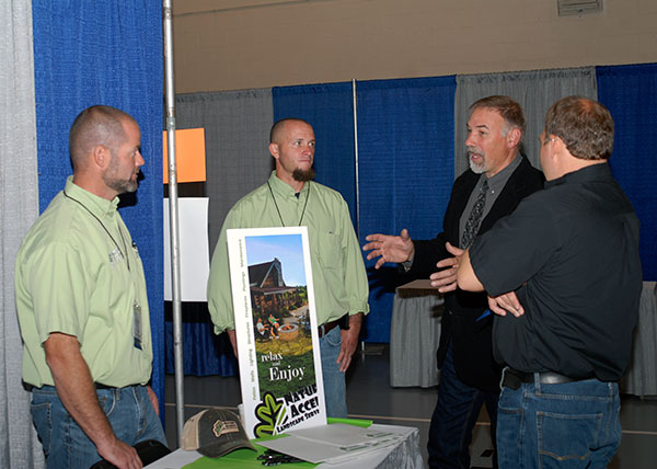 Michael A. Dincher, assistant professor of horticulture, enthralls the group from Nature’s Accents Landscape Services Inc. in Hamburg. From left are company founders Travis M. Breininger and Justin H. Bentz, 2001 graduates in landscape/nursery technology and 2011 recipients of Alumni Achievement Awards; Dincher; and company employee Anthony S. Moyer, a 2007 landscape/nursery technology alumnus.