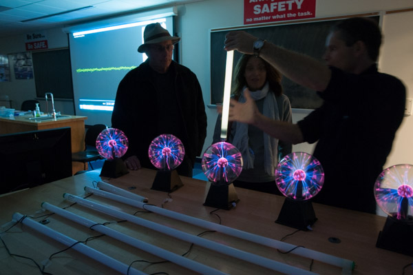 Joseph E. LeBlanc, assistant professor of physics, demonstrates the “magic” of electrical current in the “haunted physics lab.”