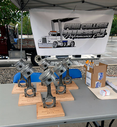 Piston-and-rod trophies for Saturday's show, handcrafted by Maslonik.