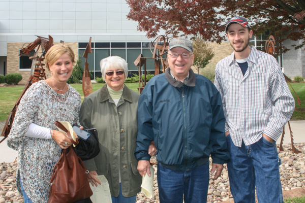Teague W. Ohl (right), a sophomore in welding technology from Cogan Station, enjoyed sharing his creativity with his mother (left) and his grandparents, who traveled to campus from the York area. <br />
 <br />

