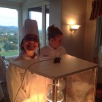 Aglow at helping a good cause is Kelsey L. Park, of Bellefonte, joined by Victoria L. Kostecki, of Center Valley.