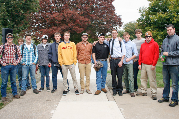 Donning everything from a WACC sweatshirt to a necktie, welding students at Friday's dedication seem pleased to escape their typical working attire for a short while. 