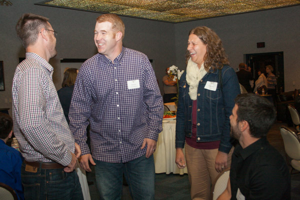 Matthew M. Frye, ’03, technology management, and wife Nichole E. (Michael) Frye, '05, nursing, share a laugh with former classmates at the Next Centennial Donor Reception.