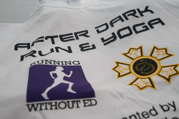 In addition to glowing accessories, runners received this After Dark Run & Yoga T-shirt. Donations from the run will help the national Running Without ED organization pay the fee necessary to attain nonprofit status.