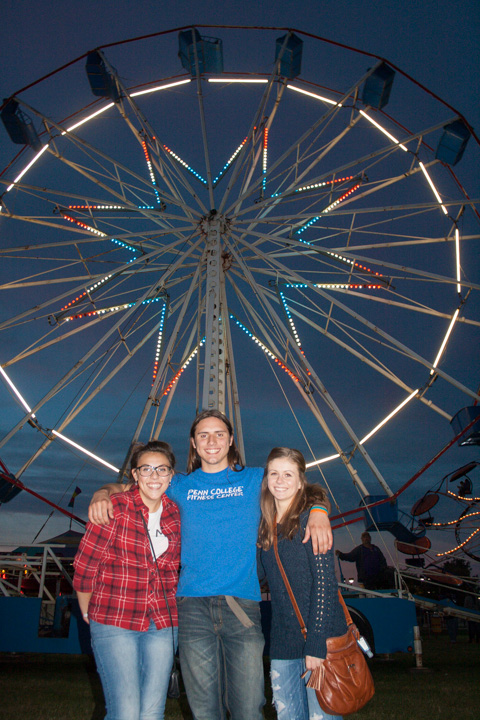 With the towering Ferris wheel behind them, Rebecca L. Rizzo (left), Anders T. Felton and Brianna M. Latovich were among the students who took in the sights, sounds and sways of the Homecoming Carnival. Rizzo is a sophomore in baking and pastry arts from Palmyra; Felton is a senior in welding and fabrication engineering technology from Armagh; and Latovich is a sophomore in nursing from Mount Carmel. 