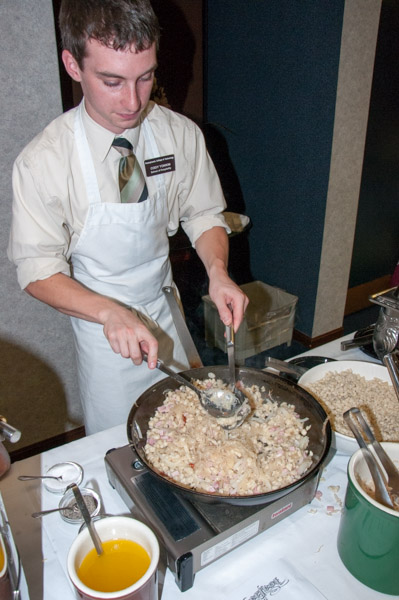 Cody M. Yonkin, a culinary arts technology student from South Williamsport, prepares spaetzle at Oktoberfest. He explains that nearly every culture has its version of cabbage and noodles, and spaetzle is Germany’s, featuring egg noodles hand made by the Catering class.
