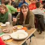 Student leader Emma J. Sutterlin enjoys a pre-holiday meal.