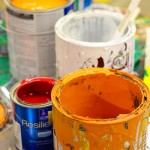 Paint cans tell a yuletide story of works in progress.