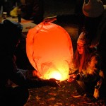 Kelsey A. Maneval (center), one of Penn College's dancers during the February 2014 THON Weekend, lends a hand.