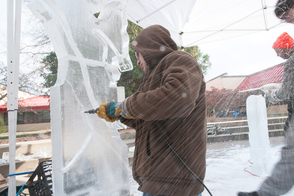 Ice flies as David L. Glunk Jr. and other student sculptors transform frozen blocks to art.