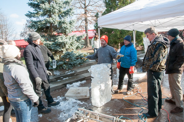 Faculty and students alike gather to learn from Chef Robert Lo Furno, a gold medal-winning ice carver.