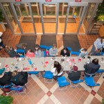 The candle-crafting table adds a new take-home treat to a long-standing ceremony.