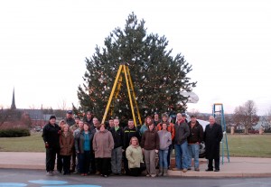 Student veterans – along with supportive friends from the Financial Aid, Admissions and Registrar’s offices at Penn College – pause for a photo during the tree’s decoration.