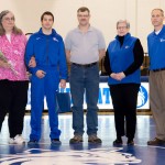 Kyle A. Suneri is joined (from left) by parents Donna and Mike Shaffer; college President Davie Jane Gilmour; and Scott E. Kennell, director of athletics.