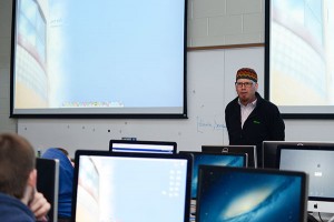John J. Messer, an associate professor of Web and interactive media, is clearly in his element in this Spring 2014 lab photo.