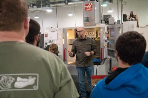 On a CNC milling machine, Rick Hendricks, instructor of machine tool technology/automated manufacturing, provides demonstrations to complement Washinger’s insights. 