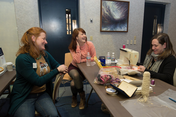 The artist (center) shares a laugh with Camille Seeling (left), of Cogan Station, and Brittany McLaughlin, of Trout Run. 