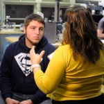 Before the camera rolls, producer Nell Abom conducts a pre-interview with plastics and polymer engineering technology student Cody J. Fisher, of Blandon.