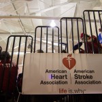 A banner at the gym entrance spreads the word.