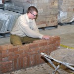 Wellsboro Area High School student Larry Walters concentrates on the masonry event.