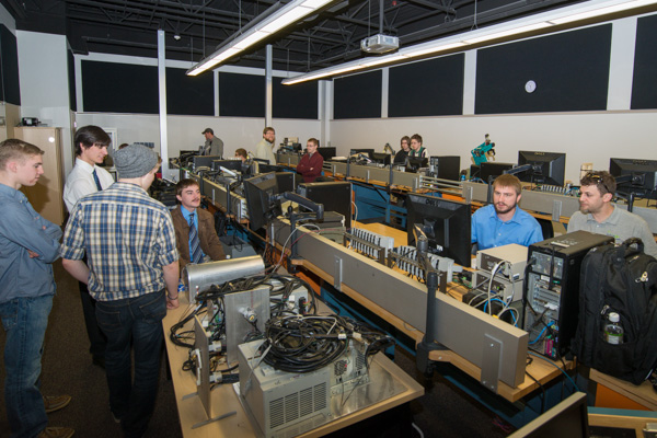 Electronics and computer engineering technology students fill a lab in the BWD ready to share their projects with visitors. 