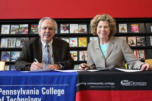 Tom F. Gregory, associate vice president for instruction at Penn College, and Katherine P. Douglas, president of Corning Community College, at the March 10 announcement.