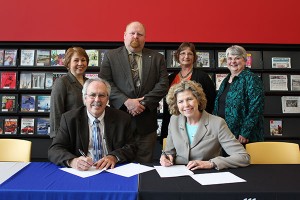 Joining Gregory and Douglas are (back row, from left) Penn College's Carol A. Lugg, assistant dean of construction and design technologies and former director of transfer initiatives, and David R. Cotner, dean of industrial, computing and engineering technologies;  and, from Corning Community College, Kimberly Perkins, director of academic outreach, and Marian Eberly, vice president and dean.