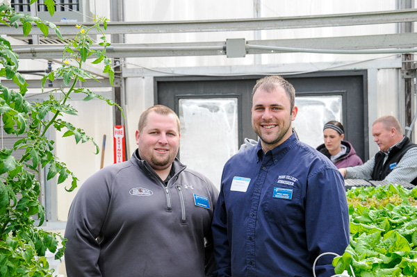 Landscape/horticulture graduates Kyle B. Brown, '11 (left), and Jeremy L. Thorne, '13, revisit as alumni volunteers.