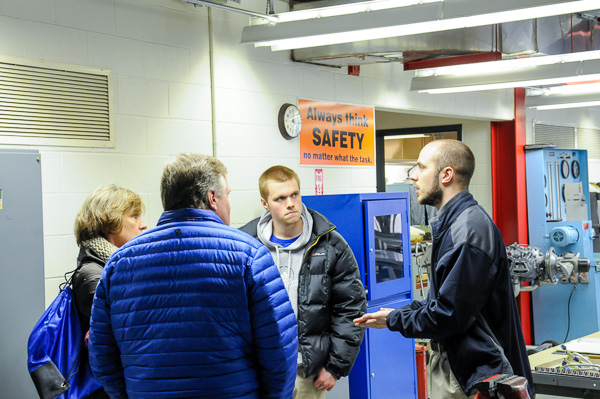 Tylor J. Burkett, an aviation maintenance technology major from Middletown, adds his perspective to a Lumley Aviation Center tour.
