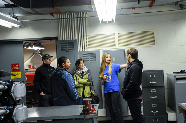 Student as spokesperson: a tradition at Penn College Open House. Kira I. Dorn, an aviation maintenance technician major from Centerville, leads a tour of the Aviation Center.