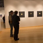 Faculty members discuss the pinhole peek provided by Germany's "On the Brink" photos.