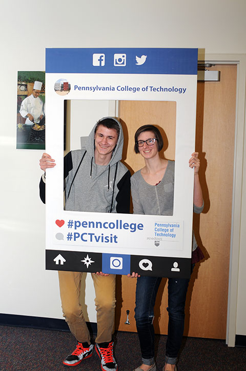 Bethany M. Reppert, of Minersville, graduating in May in applied human services, helps welcome her brother, Alex, enrolling for Fall 2015 in collision repair technology.