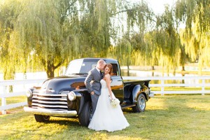 For the wedding and reception in Strasburg, the bride's father drove the couple in a vintage Chevrolet truck owned by one of Bradley's friends. Later, they found out the truck once belonged to Janae's great-grandparents! (Photo by Caroline Logan)
