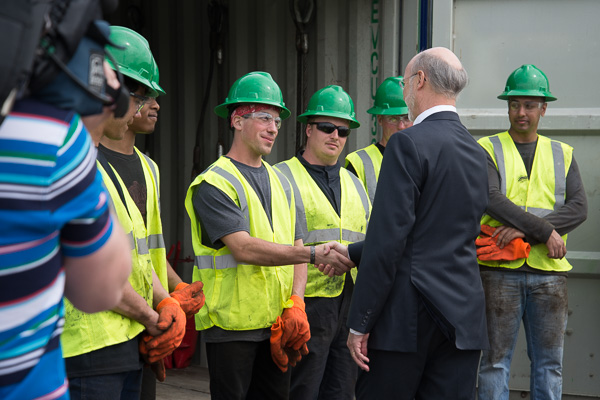 Gov. Wolf breaks away from the tour to shake hands with students.