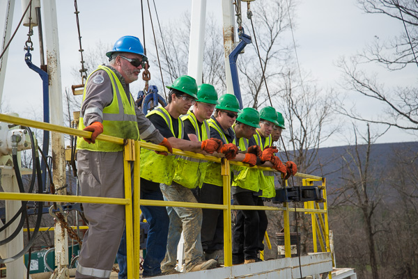 Students and Moore take a rest after their demo.